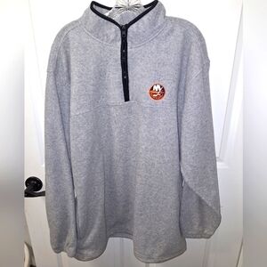 A Pro Elite New York Islanders sweatshirt in a men's size XL.